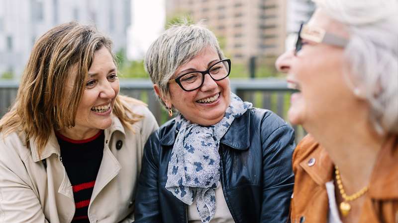 Three generations of women laughing