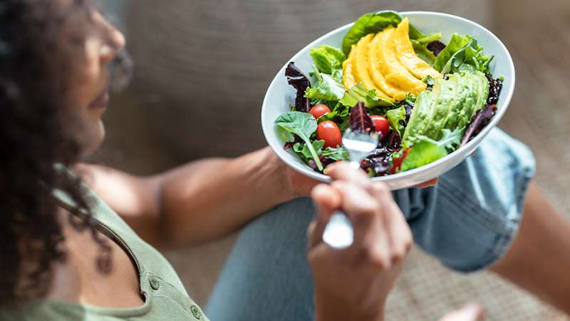 Woman eating a salad