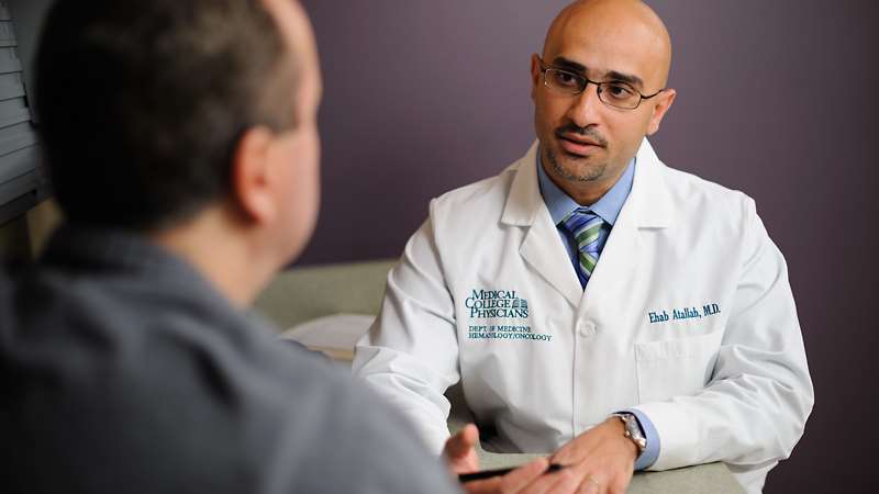 Dr. Ehab Atallah with patient