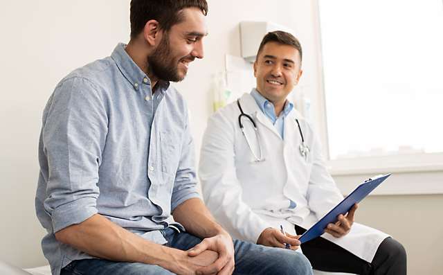 Patient Consulting with Physician