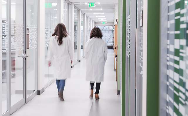 Researchers in Hallway